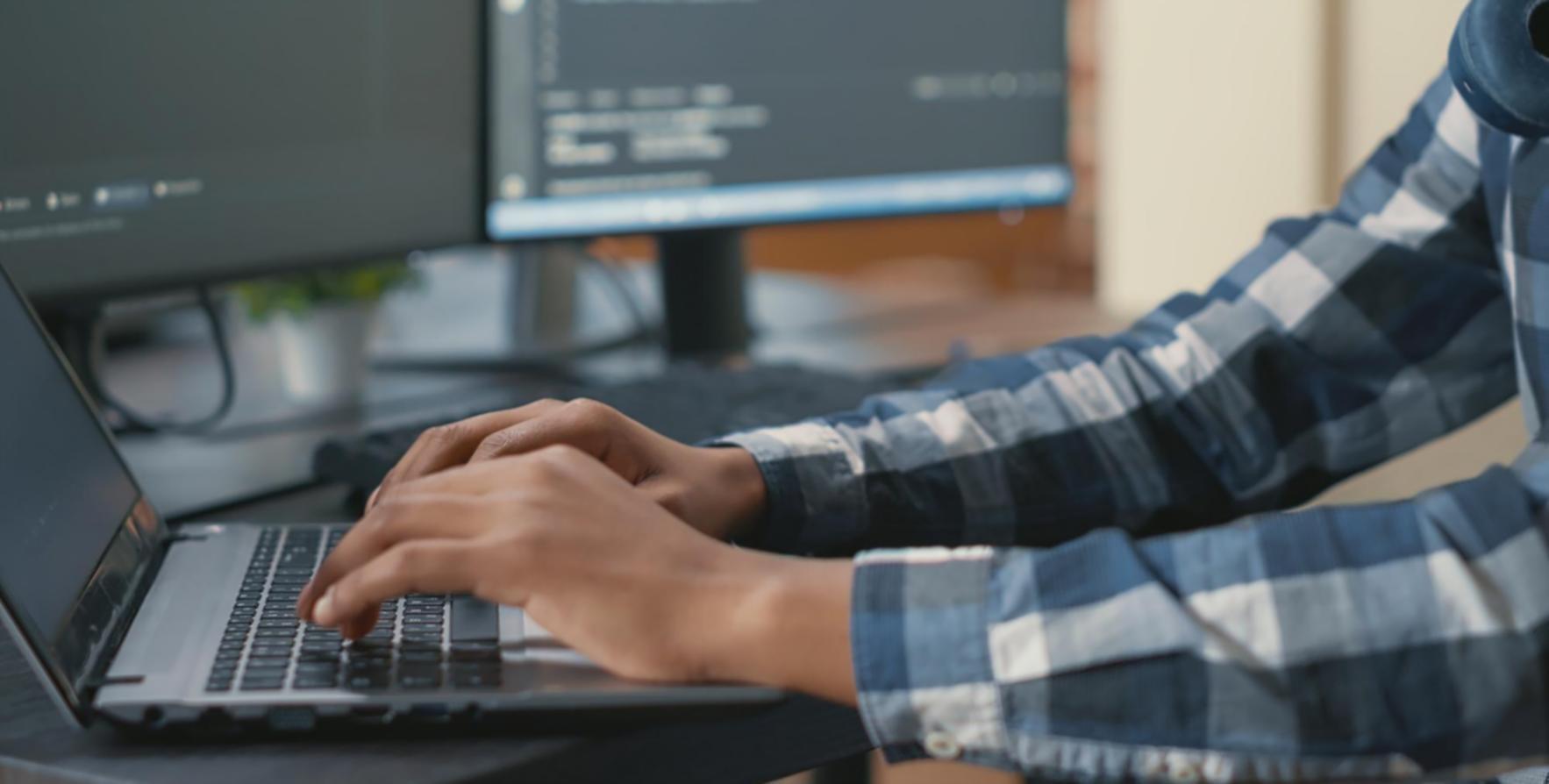 Responsive web design program classroom with students collaborating